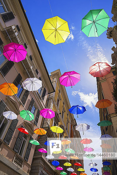 Brightly coloured floating umbrellas, Genoa, Liguria, Italy