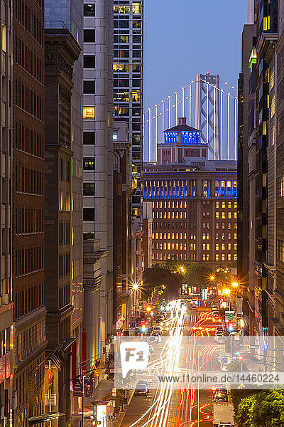 View of California Street and Oakland Bay Bridge at dusk  San Francisco  California  United States of America  North America