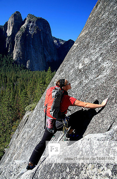Rock climber in action in Yosemite Valley  California  United States of America  North America