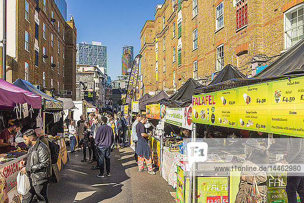 Food stalls in Petticoat Lane market  London  England
