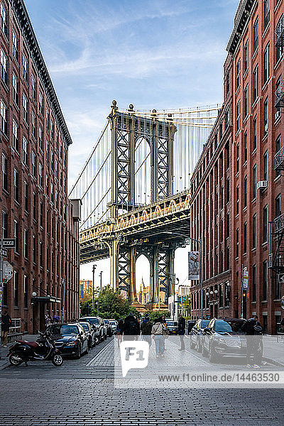 Manhattan Bridge with the Empire State Building through the Arches  seen from Washington Street in Brooklyn  New York  United States of America  North America