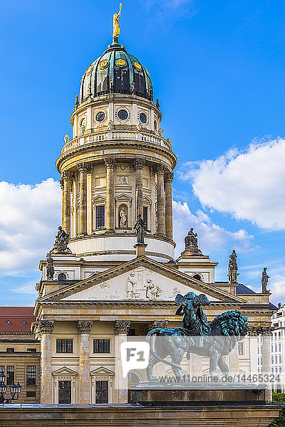 Statue in front of French Cathedral on Gendarmenmarkt square Berlin Germany