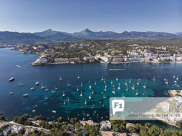Spain Baleares Mallorca Calvia region Aerial view of Santa ponca marina Serra de Tramuntana in the background