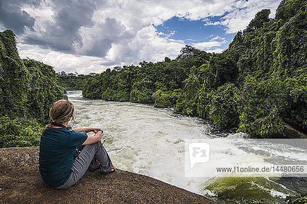 Africa  Uganda  Jinja  Tourist watching the Nile falls