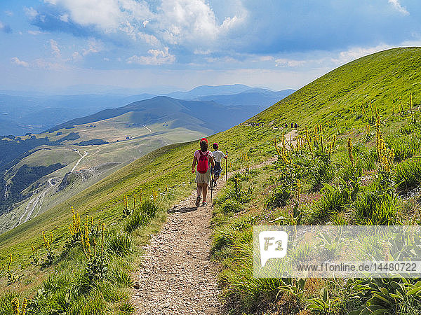 Italy  Umbria  Sibillini mountains  two children hiking mount Vettore