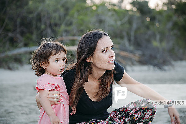 Australia  Queensland  Mackay  Cape Hillsborough National Park  mother and daughter exploring the beach