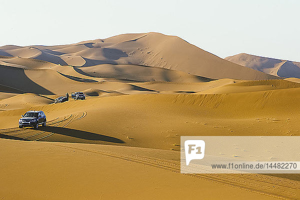 Morocco desert off-road vehicles on dune