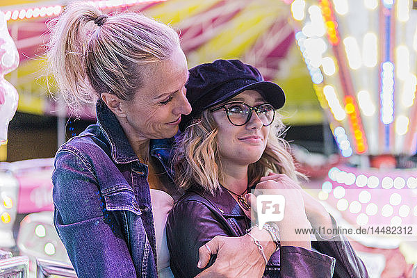 Mother and daughter together at fair