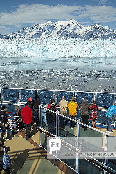 Tourists viewing Hubbard Glacier from the deck of the Coral Princess cruise ship  Disenchantment Bay  St. Elias Mountains  Southeast Alaska