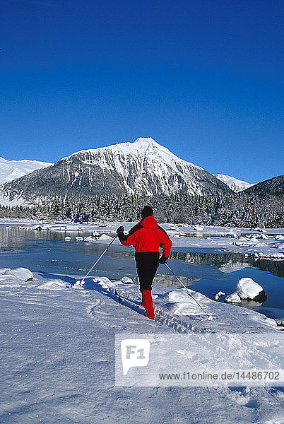 Man Cross Country Skiing Mendenhall Lake SE Winter