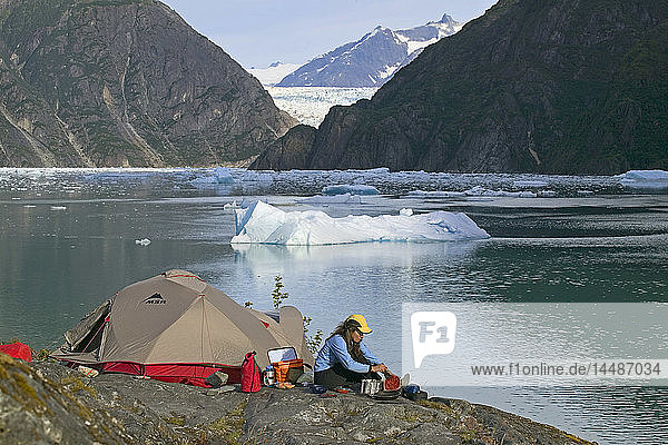 Camper Cooks on Ultralight Stove Tracy Arm SE AK Summer Fords-Terror Wilderness Area