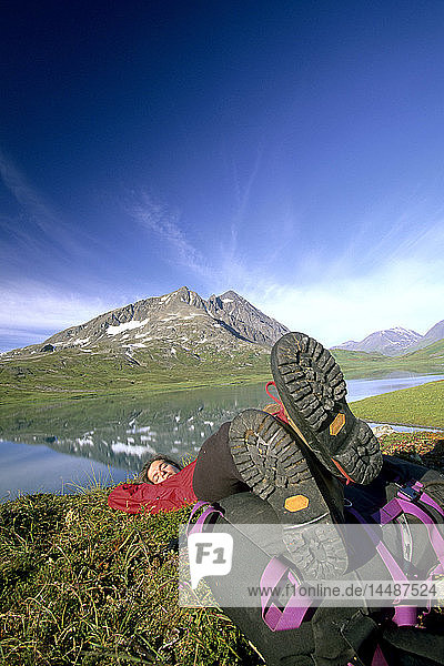 Hiker Resting at Shoreline of Lost Lake KP Alaska