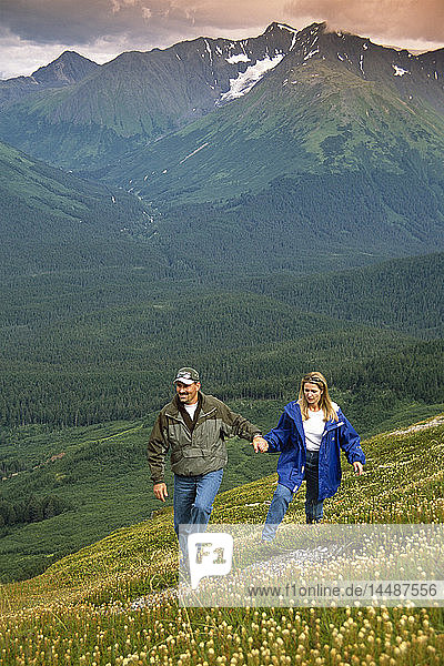 Couple Hiking on Alpine Slope Chugach Mtns SC AK Summer Alyeska Resort