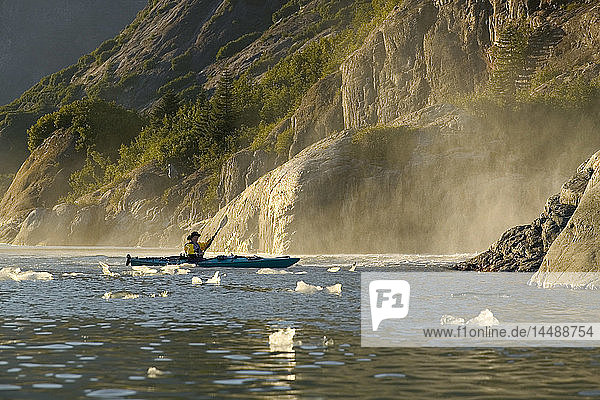 Sea Kayaker near Waterfall Sawyer Island Tracy Arm AK SE Summer Fords-Terror Wilderness Area