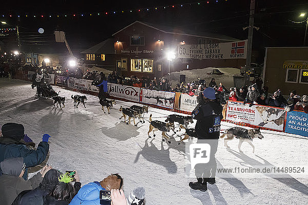 Dallas Seavey arrives at the finish chute and wins his 3rd Iditarod during Iditarod 2015