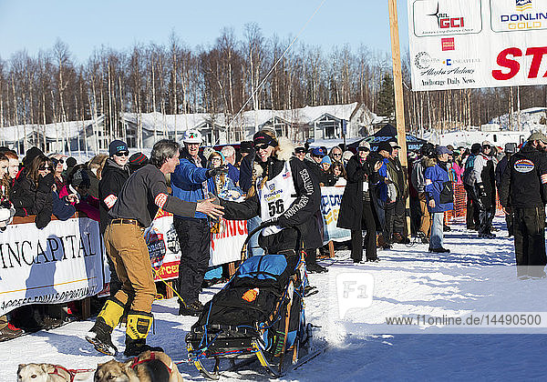 Kristy Berington heads down the chute during the restart of the 2014 Iditarod  Willow  Southcentral Alaska