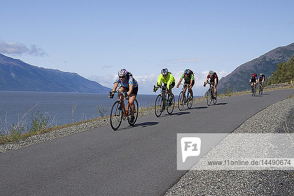 Bicyclists on bike trail during Summer along Seward Highway  Southcentral Alaska
