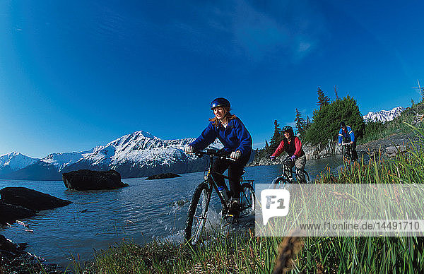 Group Biking on Beach Bird Point Southcentral Alaska