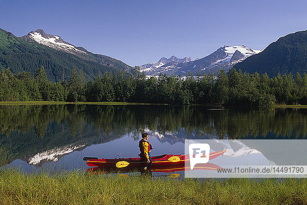 Woman Kayaker in Moose Lake Near Mendenhall Glacier SE AK