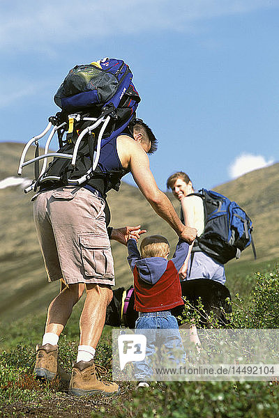 Man & Woman Hiking With Child Chugach State Park AK