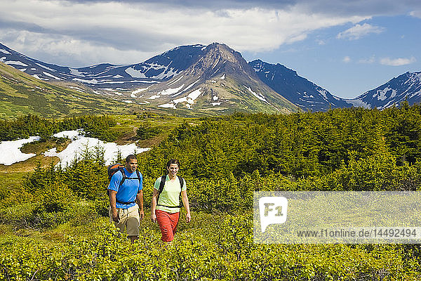 Couple hiking trail below Flat Top Mountain  Glenn Alps area  Chugach State Park  Southcentral Alaska