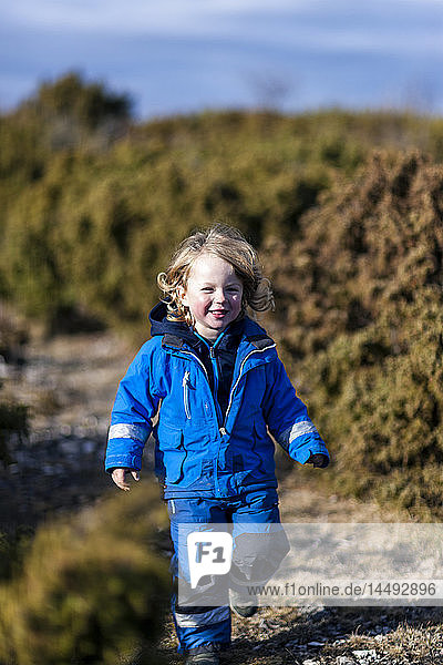Happy boy running Sweden