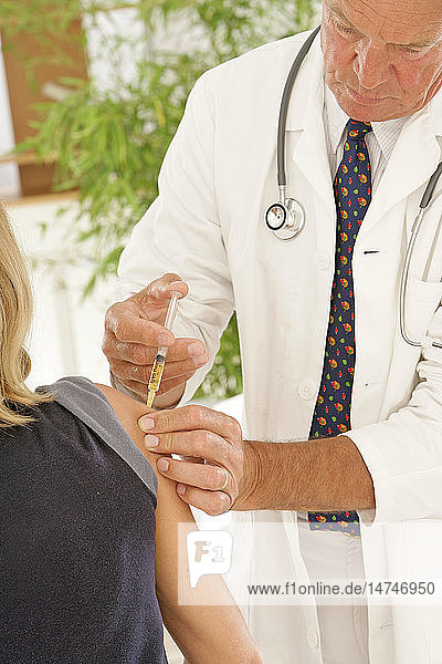 VACCINATING A WOMAN