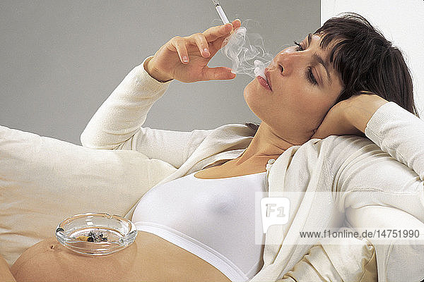 PREGNANT WOMAN SMOKING