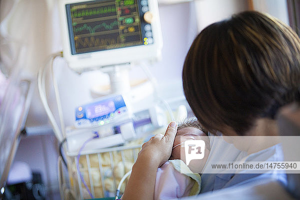 Reportage in the level 2  neonatology service in a hospital in Haute-Savoie  France. A new mother looks after her premature baby.