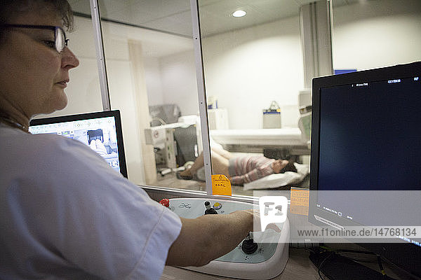Reportage in a radiology centre in Haute-Savoie  France. A patient with a knee prosthesis has a check-up x-ray.