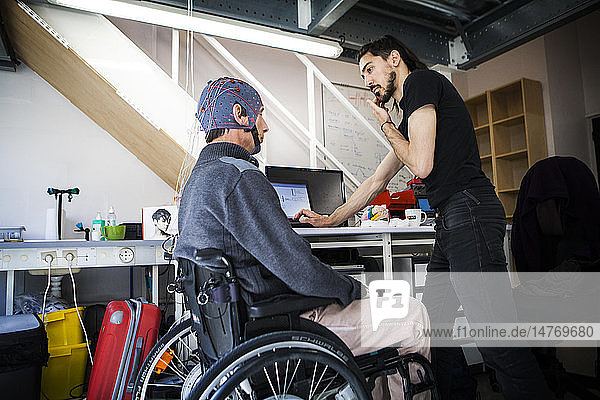 The first Cybathlon will be held in Switzerland in October 2016. It is a competition for athletes equipped with bionic devices (robotized prosthetic legs and arms  motorized wheelchairs  exoskeletons  bikes using electrical muscle stimulation and brain-computer interface races). This competition helps raise public awareness on the evolution of work on robotic assistive technology and strengthens exchanges between research teams. Among the French teams is ENS Lyon. This team will take part in the cycle race  with a bike that has electrical muscle stimulation  as well as the brain-computer interface race during which tetraplegic athletes steer their avatar during virtual races using brain signals. The team leader  Vince  will be one of the pilots. He has been tetraplegic since a bike accident  and is a physics researcher. He changed his research to technology  which can help handicapped people in their daily lives. He is training for the brain computer interface race with Amine  a postdoc researcher in physics. He is wearing an EEG helmet which enables his neuronal activity to be tracked. The team has to determine the signals that are the most perceptible and isolatable on the EEG so that a computer action can be attributed to an “order from the brain.