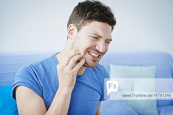 Man with toothache