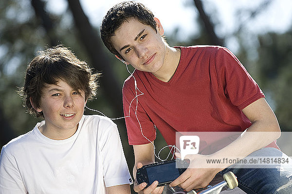 ADOLESCENT PLAYING VIDEO GAME