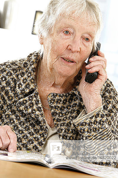 ELDERLY PERSON ON THE PHONE