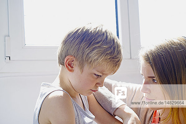 5-year-old boy with his babysitter.