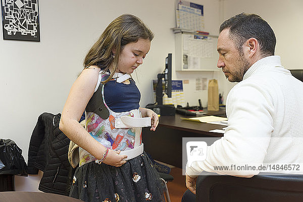 Reportage in the Rossetti Centre in Nice  France  during Professor Griffet’s monthly consultations. He is an orthopedic surgeon from Grenoble Hospital  and founder of this centre. This young teenager suffers from neurofibromatosis and also has scoliosis  one of the complications of this disease.