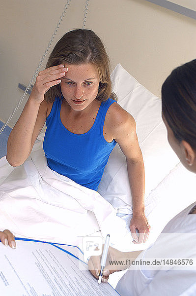 WOMAN HOSPITAL PATIENT W. NURSE