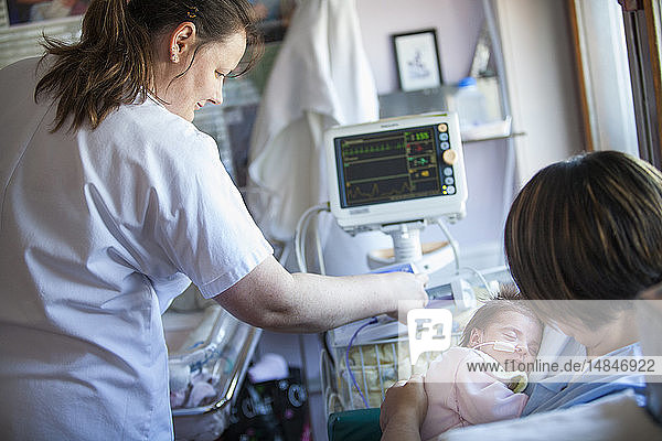 Reportage in the level 2  neonatology service in a hospital in Haute-Savoie  France. A new mother looks after her premature baby.