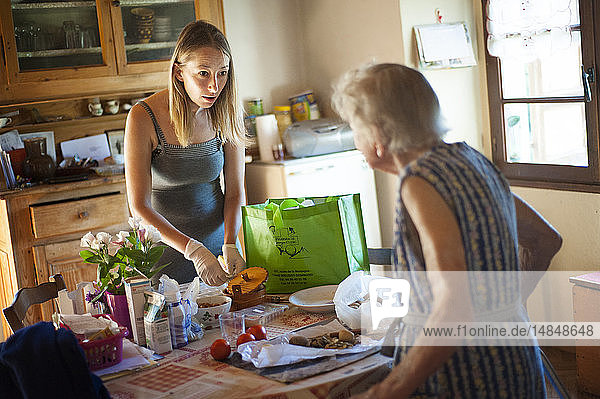 Reportage on an independent nurse in Haute-Savoie France. Aline travels round her small mountain town every day to meet her patients. She also has a practice in town that she shares with two other colleagues. Aline visits a patient to prepare her pill dispenser.