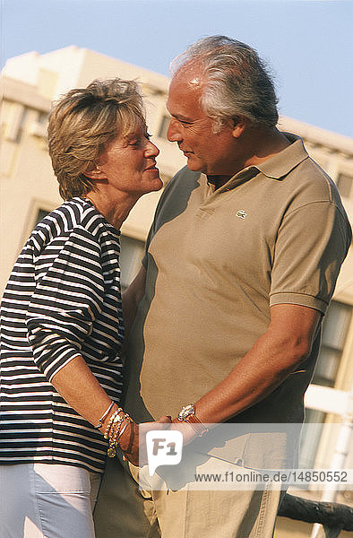 ELDERLY COUPLE OUTDOORS