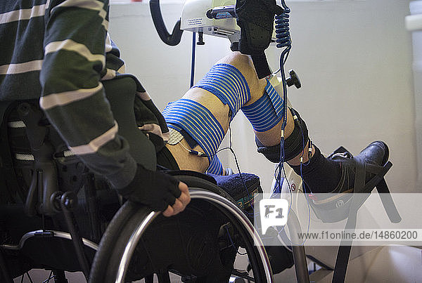 The first Cybathlon will be held in Switzerland in October 2016. It is a competition for athletes equipped with bionic devices (robotized prosthetic legs and arms  motorized wheelchairs  exoskeletons  bikes using electrical muscle stimulation and brain-computer interface races). This competition helps raise public awareness on the evolution of work on robotic assistive technology and strengthens exchanges between research teams. Among the French teams is ENS Lyon. This team will take part in the cycle race  with a bike that has electrical muscle stimulation  as well as the brain-computer interface race during which tetraplegic athletes steer  using brain signals  their avatar during virtual races. Julien is paraplegic and will be one of the team’s pilots. He is practicing for the bike race on the Restorative Therapies RT300  which enables him to work pedals through electrostimulation. Sebastien  a postdoc researcher in neurosciences and a physiotherapist  helps him to correctly position the electrodes and calibrate the intensity of the training session. This technology is used a lot in rehabilitation in other countries.