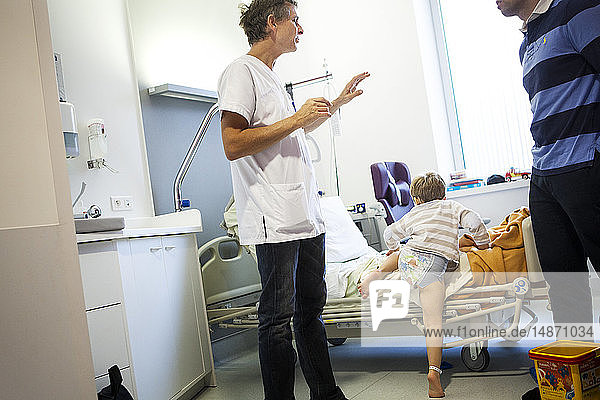 Reportage in the pediatric emergency unit in a hospital in Haute-Savoie  France. A doctor examines a young boy.