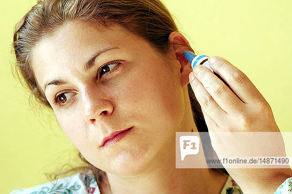 EAR TREATMENT  WOMAN