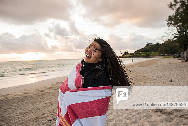 Woman swinging hair  Kailua Beach  Oahu  Hawaii
