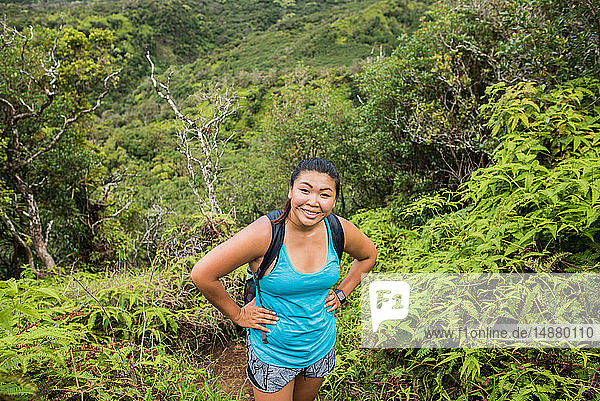 Hiker enjoying rainforest  Iao Valley  Maui  Hawaii