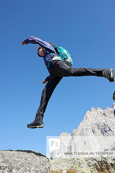 Mountain climber jumping  Chamonix  Rhone-Alps  France