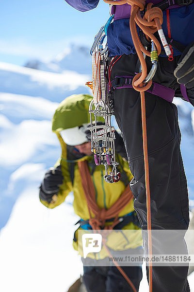 Safety harness worn by mountaineer
