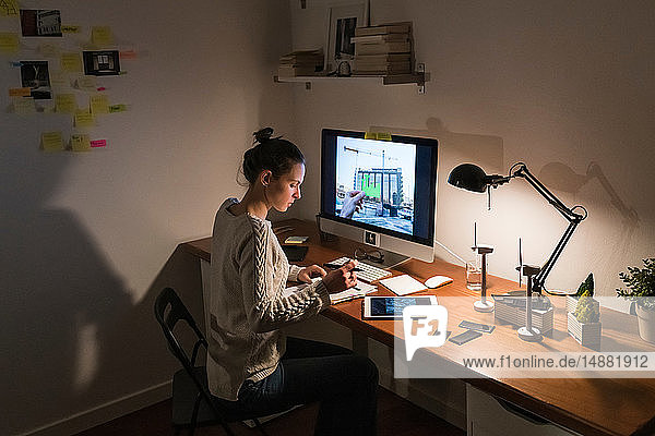 Woman working late at home