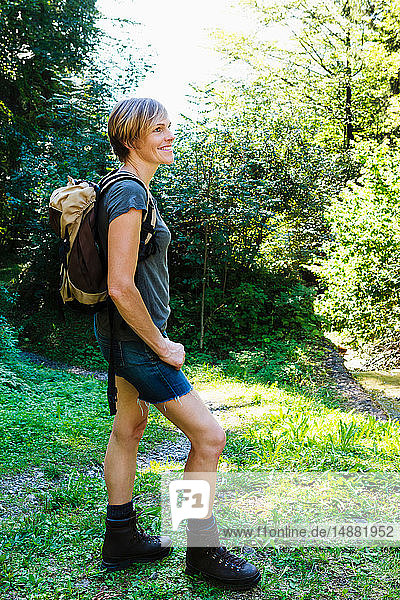 Woman exploring forest  Sonthofen  Bayern  Germany