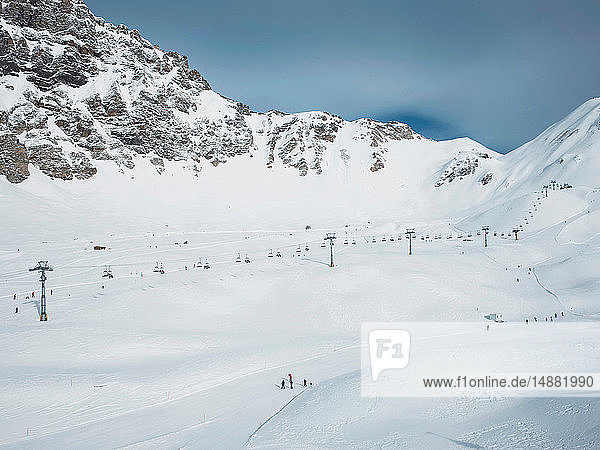 Ski lift in snow covered mountain valley landscape  Alpe Ciamporino  Piemonte  Italy